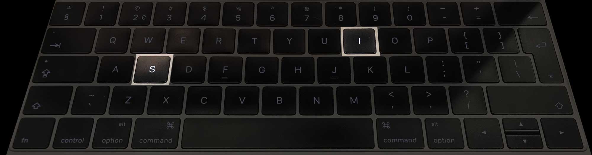 A keyboard with the letters I and S highlighted