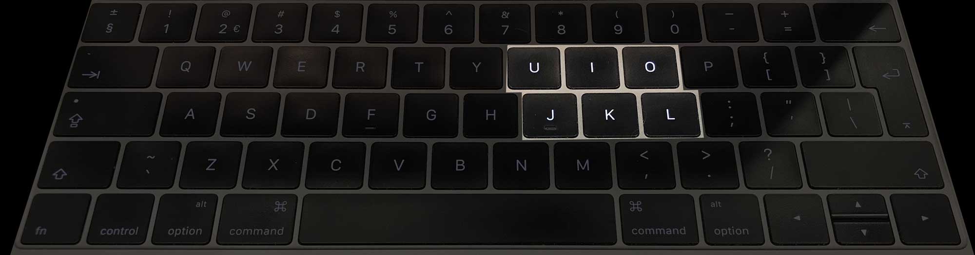 A keyboard with the letters u, i, o, j, k, and l highlighted